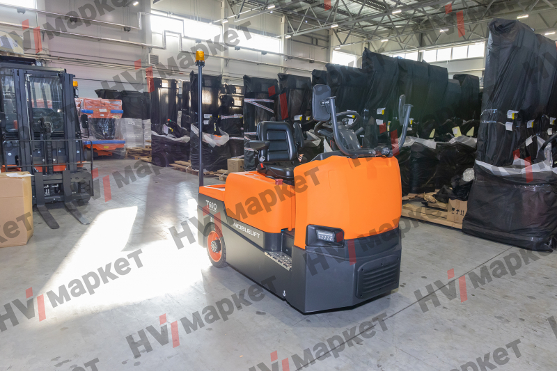 Самоходный Тягач для склада/производства T60Q 6000kg (Литий 200Ач + 100Ач, blue light and rearview mirror, walkie mode button, optional Controller Curtis F4A and display, Seat armrest) HV Market